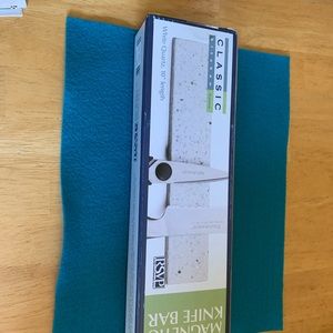 Magnetic knife wall holder